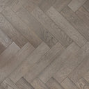 Gunmetal grey herringbone engineered wood flooring, brushed matte finish plank pattern