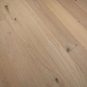 Light oak SPC click flooring planks, brushed grain texture with dark knot spots
