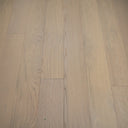 Light oak SPC click vinyl floor planks with subtle grain pattern and seams