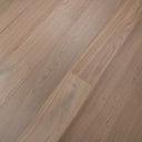 Smoked white oak SPC click flooring, close-up brushed wood grain texture