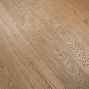 Distressed engineered wood plank flooring showing knot and swirl wood grain