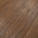 Engineered wood flooring in distressed golden light brown, wide plank boards texture