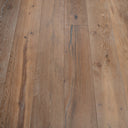 Smoked white distressed engineered wood planks with visible grain and dark character marks