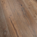Engineered wood flooring in smoked white, distressed texture with knots and streaks