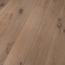 Distressed engineered wood flooring planks, light oak tones and visible knots