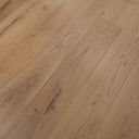 Light oak engineered wood flooring close-up, hand-scraped surface with knots and streaks