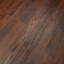 Rust-brown engineered wood flooring planks with long boards and distinct wood grain