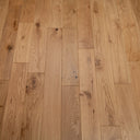 Natural oak engineered wood flooring, brushed lacquered planks with clear grain knots