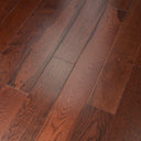 Walnut stained engineered wood flooring planks with smooth matte finish, staggered