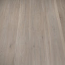 Wood-look vinyl plank flooring, light gray-beige tone with visible seams