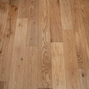 Light brown engineered hardwood planks with clear wood grain and staggered seams