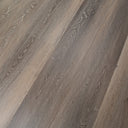 Ash brown SPC vinyl plank flooring showing interlocking planks and wood grain