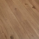 Engineered brushed lac wood flooring detail with knots in light tan planks