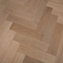 Engineered herringbone wood flooring, light wood tones, interlocking plank design
