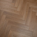 Honey oak herringbone SPC vinyl flooring with staggered plank design