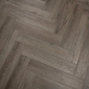 Misty smoked SPC vinyl flooring, herringbone-style light gray boards