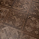 Caramel brown parquet floor panel with diagonal herringbone wood pattern