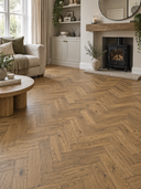 Cognac oak engineered herringbone wood flooring with warm brown parquet pattern