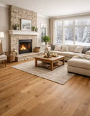 Engineered brushed lac wood flooring laid across the room in light tan planks