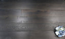 Jet black engineered wood flooring planks with wide horizontal seams