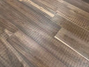 Engineered smoked gray wood flooring planks with brushed, oiled texture in parallel rows