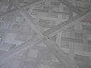 Silver grey parquet-pattern floor tile panel showing crosshatch diagonal layout