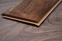 Engineered acacia flooring plank with beveled click edge, warm brown wood grain