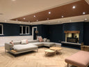 Engineered herringbone click wood flooring in light natural oak tone, plank pattern view